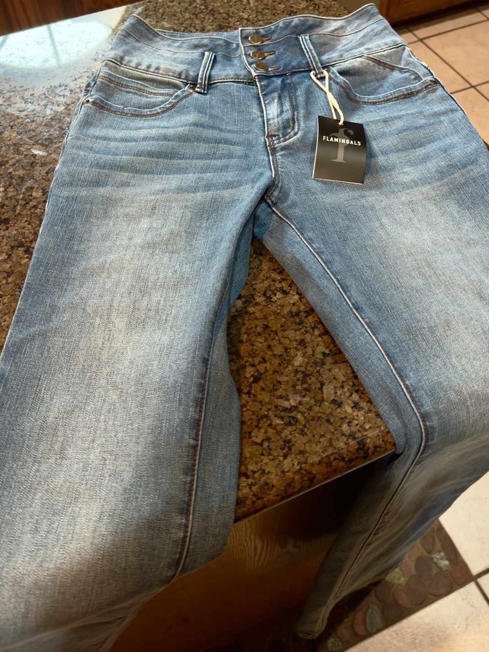 Flamingals butt lifting boot cut jeans. NWT